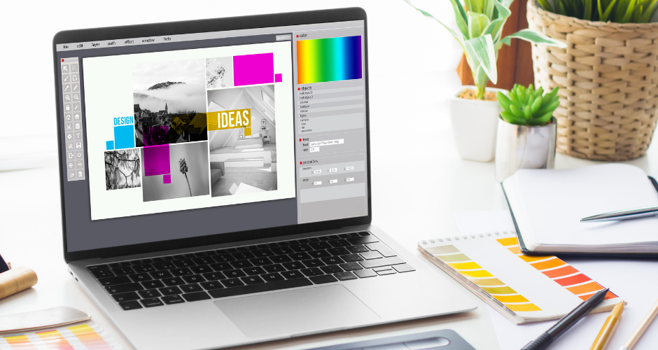 Laptop displaying a digital design workspace surrounded by color swatches and creative tools on a desk.